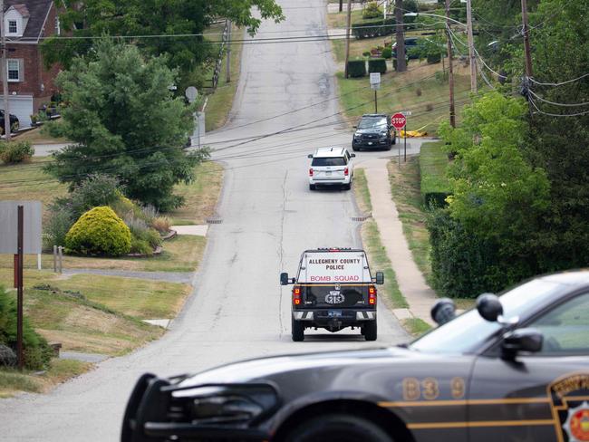 Police Bomb Squad car drives towards the home of Thomas Matthew Crooks, the suspected shooter of former US president Donald Trump, as the FBI carries out an investigation. Picture: AFP