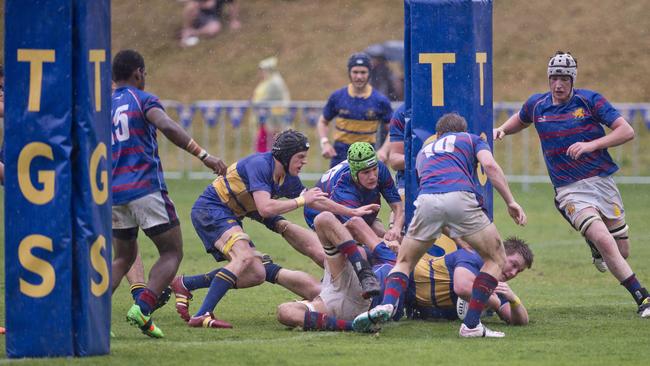 Harry Hoopert scores for Grammar. Photo Nev Madsen / The Chronicle