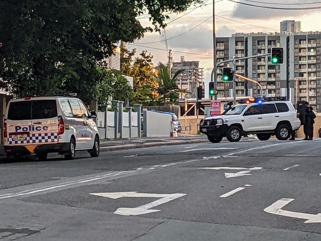 Police close a street at Bowen Hills. Picture: David Clark