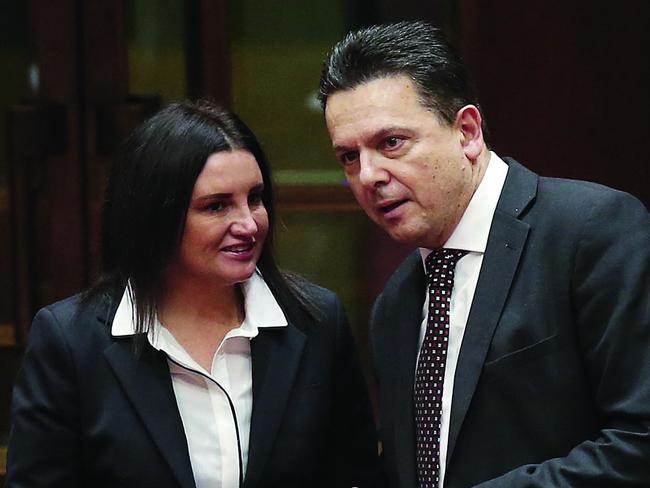 Senator Nick Xenophon and Senator Jacqui Lambie in the Senate Chamber at Parliament House in Canberra. Picture Kym Smith