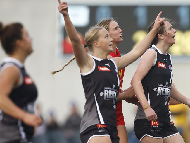 MELBOURNE, AUSTRALIA - MAY 21: Claire Mahony of the Rebels (R) celebrates kicking a goal during the round seven Coates Talent League Girls match between GWV Rebels and Gold Coast Suns Academy at Ikon Park on May 21, 2023 in Melbourne, Australia. (Photo by Daniel Pockett/AFL Photos/via Getty Images)