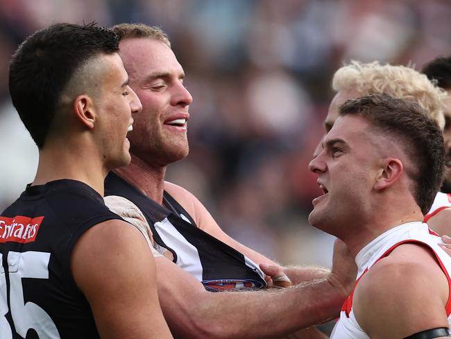 MELBOURNE. 07/05/2023. AFl.  Round 8. Collingwood vs Sydney at the MCG. Players punch on after Swans players got stuck into Nick Daicos of the Magpies after a Sydneys  Ryan Clarke 1st qtr goal   . Pic: Michael Klein