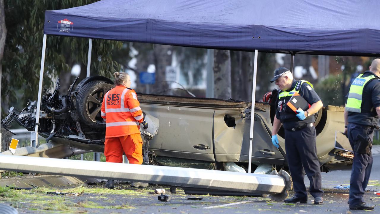 Police and emergency services at a fatal car crash on Plenty Rd in Bundoora on Thursday. Picture: David Crosling