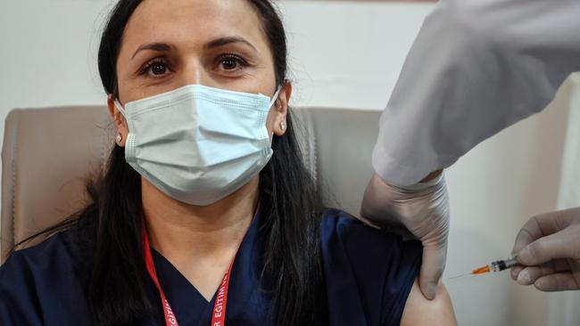 A medical worker receives an injection of the Chinese Sinovac COVID-19 vaccine in Istanbul, Turkey, on Thursday. Picture: AFP