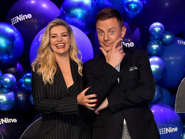 Ninja Warrior hosts Rebecca Maddern and Ben Fordham.