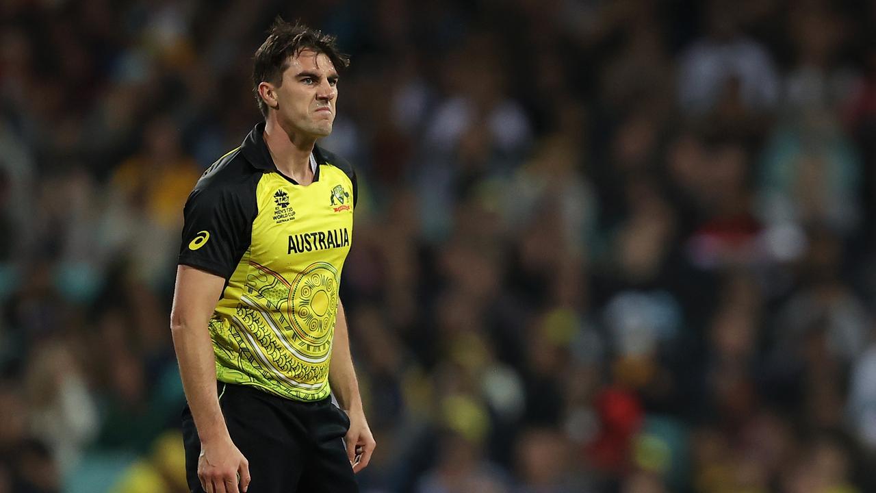 SYDNEY, AUSTRALIA - OCTOBER 22: Pat Cummins of Australia reacts after attempting a run out during the ICC Men's T20 World Cup match between Australia and New Zealand at Sydney Cricket Ground on October 22, 2022 in Sydney, Australia. (Photo by Mark Kolbe/Getty Images)