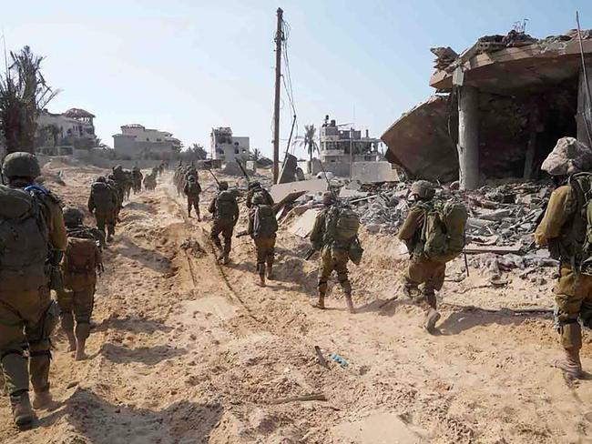 Israel troops patrolling inside the Gaza Strip as battles between Israel and the Palestinian Hamas movement continue. Picture: Israeli Army / AFP