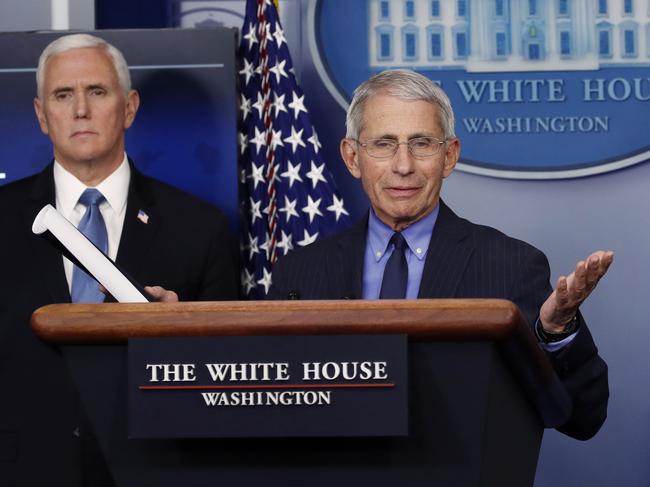 Mike Pence listens as Dr. Anthony Fauci, director of the National Institute of Allergy and Infectious Diseases, speaks about the coronavirus. Picture; AP