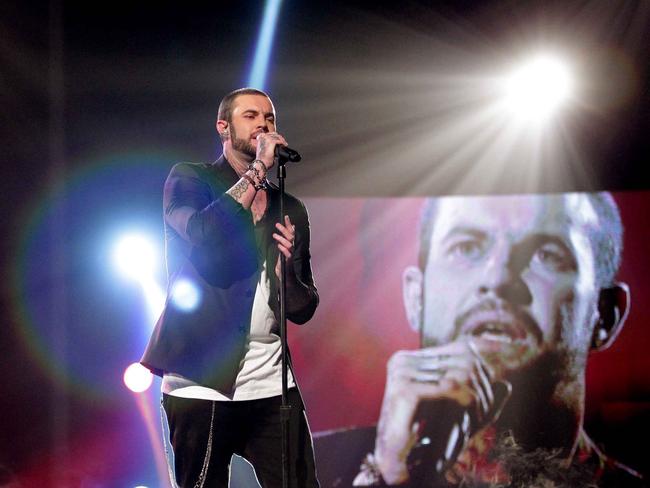 Contestant Mitchell Callaway performs on stage during the 2011 season of the Channel Seven (7) TV program 'X Factor Australia' at Fox Studios in Moore Park, Sydney.