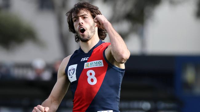 Tom Silvestro celebrates a goal for Coburg. Picture: George Salpigtidis