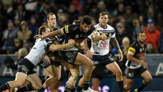 Viliame Kikau of the Panthers is tackled by Michael Morgan of the Cowboys during the Round 9 NRL match between the Penrith Panthers and the North Queensland Cowboys at Carrington Park in Bathurst, Friday, May 4, 2018. (AAP Image/Dean Lewins) NO ARCHIVING, EDITORIAL USE ONLY