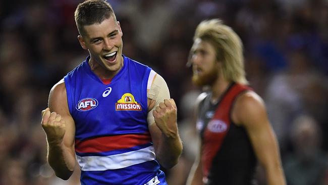 Josh Dunkley celebrates a big goal against the Bombers.