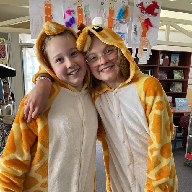 Lucy Orme and Dulcie Clarke, who both took inspiration from the anxious giraffe in the Madagascar movies and books, at the Strathfieldsaye Primary School Book Week celebrations. Picture: Julieanne Strachan