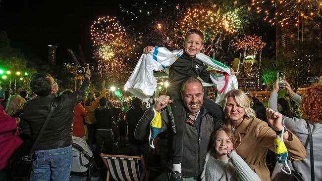 Paul and Annette Greenop of Bardon celebrate with children Jack, 7 and Ella, 9 as Brisbane was announced as the host city for the 2032 Olympic Games. Picture: Zak Simmonds