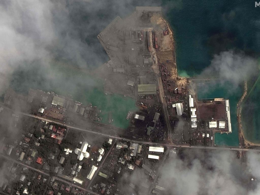 This satellite image shows volcanic ash covering the main port facilities in Nukuâ alofa, the capital of Tonga, after a volcanic eruption. Picture: AFP