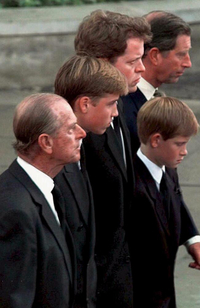 (L-R) Prince Philip Duke of Edinburgh, Prince William, Charles, Earl Spencer, Diana's brother, Prince Harry, and Prince Charles walk together behind the carriage carrying the coffin of Princess Diana. Picture: AFP