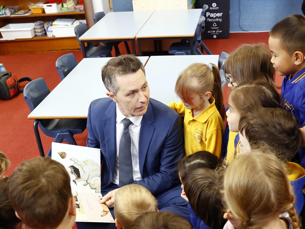 Education Minister Jason Clare, pictured with a Sydney kindergarten class in July, will introduce Labor’s childcare subsidy legislation to parliament next week. Picture: Richard Dobson