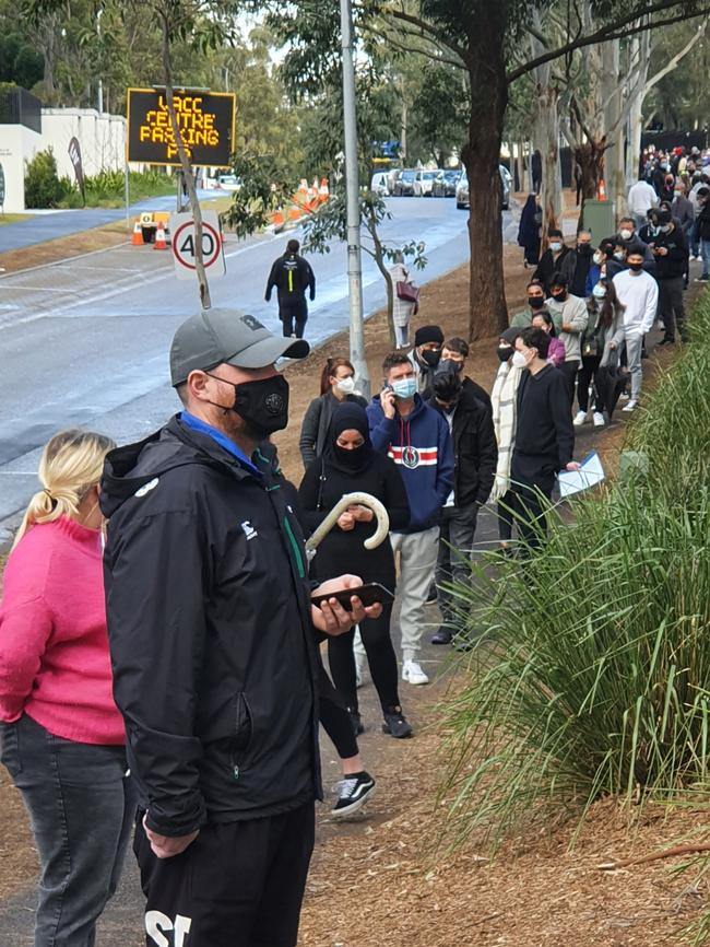 People lining up at 8.30am on Sunday at the Homebush vaccination hub. Picture: Adam Yip