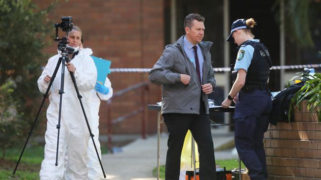 The crime scene in Hamilton South, Newcastle, where a man was shot dead at the front door of his apartment block on Tuesday night. Picture by Peter Lorimer.