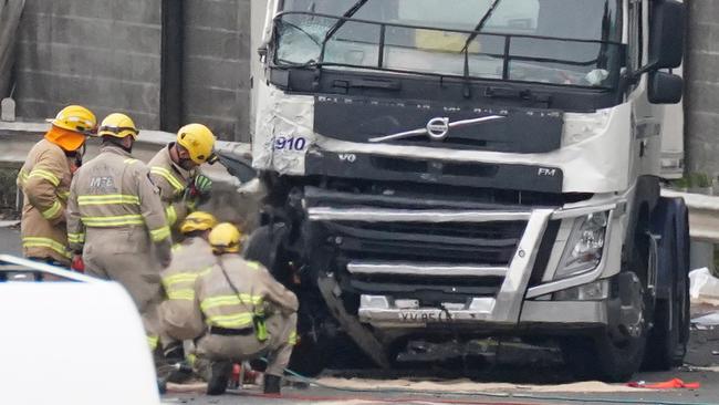 Emergency services work at the scene of the collision on the Eastern Freeway at Kew in Melbourne. Picture: AAP Image/Scott Barbour