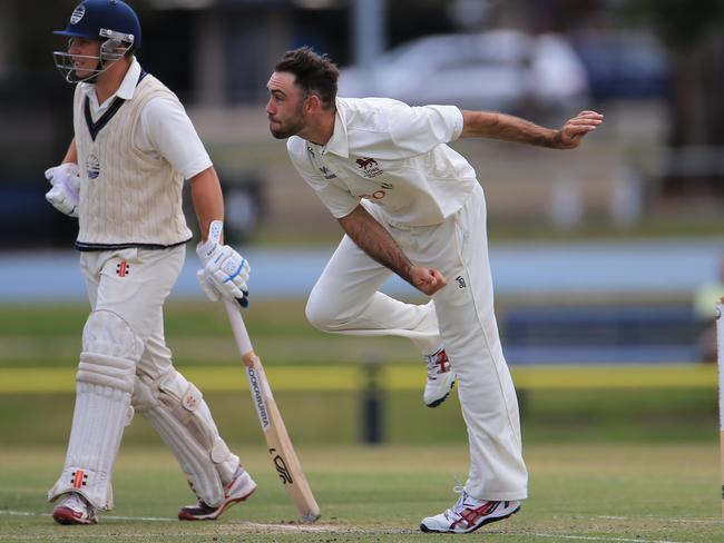 Glenn Maxwell gets through his delivery stride. Picture: Peter Ristevski