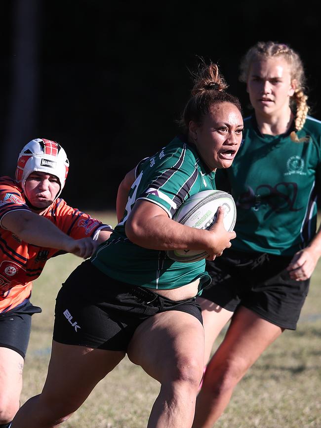 Wanderers' Ellianna Suluvale puts in a strong run in the FNQ Rugby Women's match between the Northern Beaches Mudcrabs and the Cairns Wanderers, held at Wattle Street Oval, Yorkeys Knob. PICTURE: BRENDAN RADKE