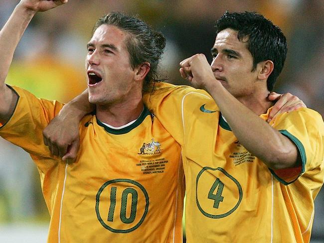 SYDNEY, NSW - NOVEMBER 16: (L-R) Harry Kewell and Tim Cahill of the Socceroos celebrate victory after the second leg of the 2006 FIFA World Cup qualifying match between Australia and Uruguay at Telstra Stadium November 16, 2005 in Sydney, Australia. (Photo by Cameron Spencer/Getty Images)