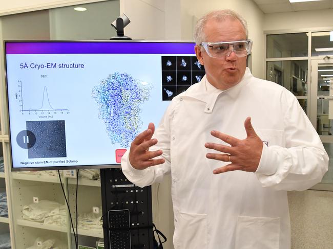 BRISBANE, AUSTRALIA - OCTOBER 12: Prime Minister Scott Morrison is seen during a tour of the University of Queensland Vaccine Lab on October 12, 2020 in Brisbane, Australia. Prime Minister Morrison was touring the University of Queensland's Vaccine Lab to look over their research as they try to develop a vaccine for the coronavirus (COVID-19). (Photo by Darren England - Pool/Getty Images)