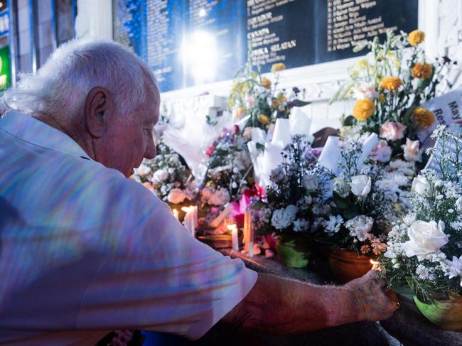 KUTA, BALI, INDONESIA - OCTOBER 12: A man lights candle during a commemoration ceremony of the 20th anniversary of the attack on October 12, 2022 at the 2002 Bali Bombing Memorial monument in Kuta, Bali, Indonesia. The Bali bombings took place 20 years ago in 2002, killing 202 people including 88 Australians. (Photo by Agung Parameswara/Getty Images)