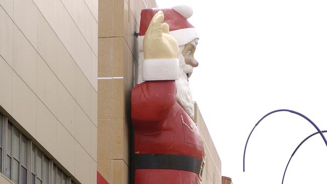 Father Christmas in his old position on the front of David Jones in Rundle Mall.