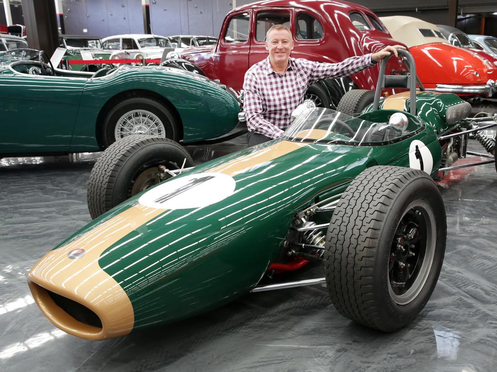 Gosford Classic Car Museum owner Tony Denny with some of the new cars at the museum. For summer guide. Picture: Mark Scott