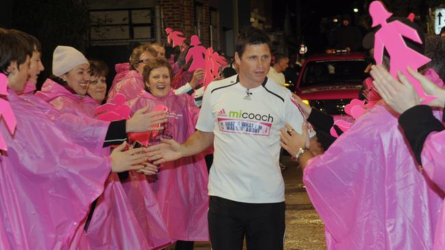 Shane Crawford runs into the Channel 9 studio, at the end of his That's What I'm Walkin' About Charity Run for Breast Cancer. Walk.