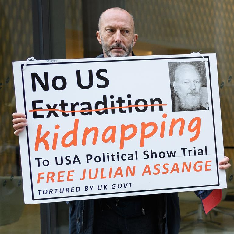 An Assange supporter outside a court that heard the US had tried to allegedly kidnap Julian Assange from the Ecuadorian embassy. Picture: Leon Neal/Getty Images