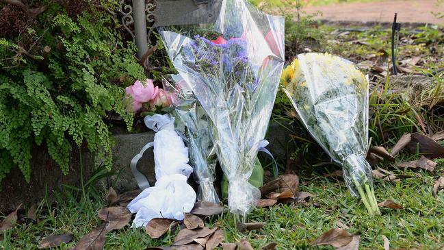 Flowers outside the Carlingford home after news spread in the street of the tragedy. Picture: Jeremy Piper