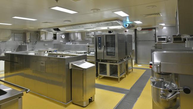 The galley is a full-scale commercial kitchen with ovens, cooktops, microwaves, dishwashers, stainless steel sinks and a bread maker. Picture: Damen/Australian Antarctic Division