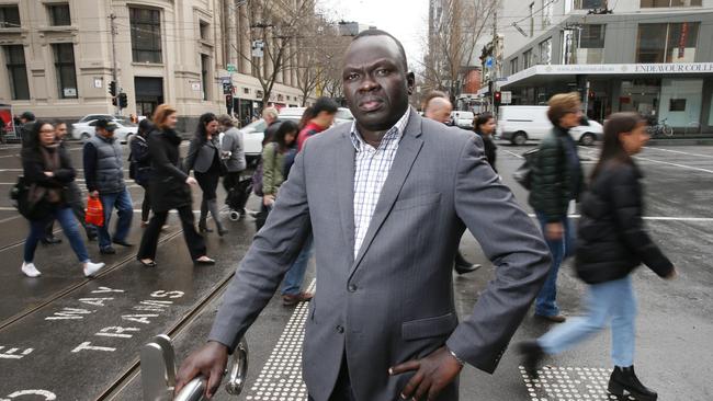 Richard Deng from the South Sudanese Community Association of Victoria, speaking about the importance of not generalizing when talking about race, racial profiling by police and what can be done to help young African kids committing crimes. Richard pictured in the cityPicture: Mark Wilson