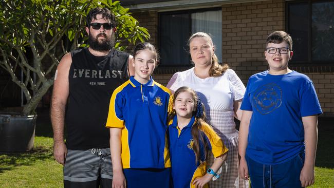 Elissa and Daniel Gooderham with their children (youngest to oldest) Violet, Mia and Sammy Gooderham outside their rental home outside of Oakey, Wednesday, December 7, 2022. Picture: Kevin Farmer