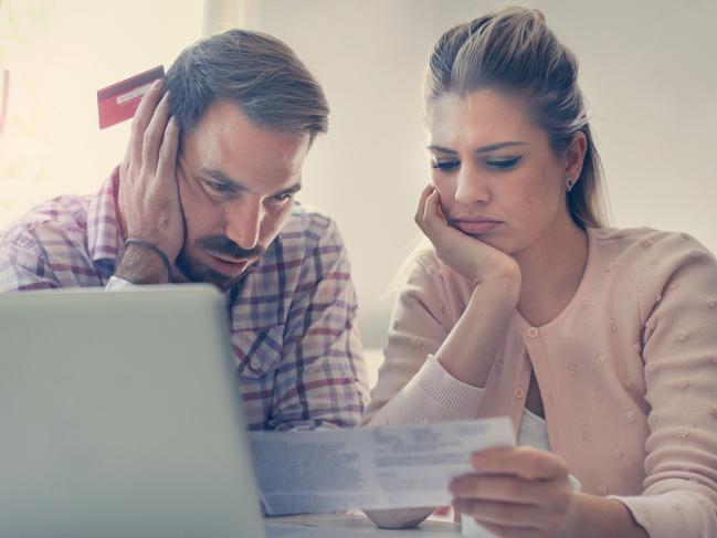 You should always read the fine print before entering into a debt consolidation agreement. Picture: iStock. 