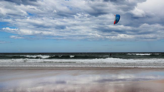 The man was pulled from the water at Greenhills Beach. Picture: Brett Costello