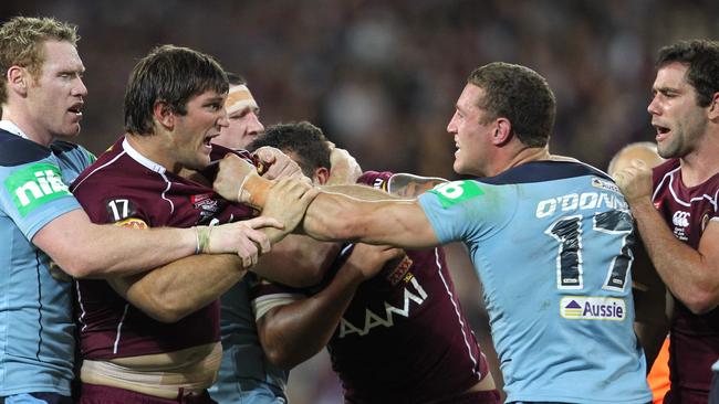 Dave Taylor and Luke O'Donnell square up. Photo: Darren England