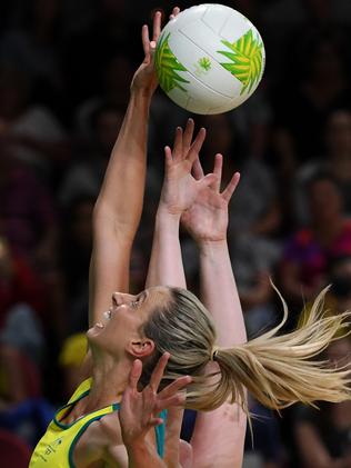 Laura Geitz (left) and Lisa Bowman contest for the ball.