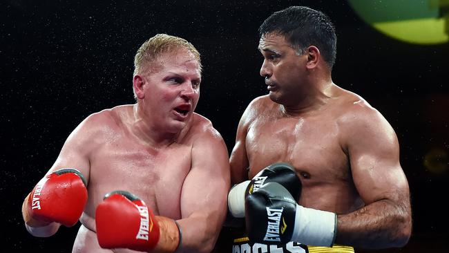 Ben Hannant and Justin Hodges during their bout in Brisbane. Picture: Albert Perez/Getty Images