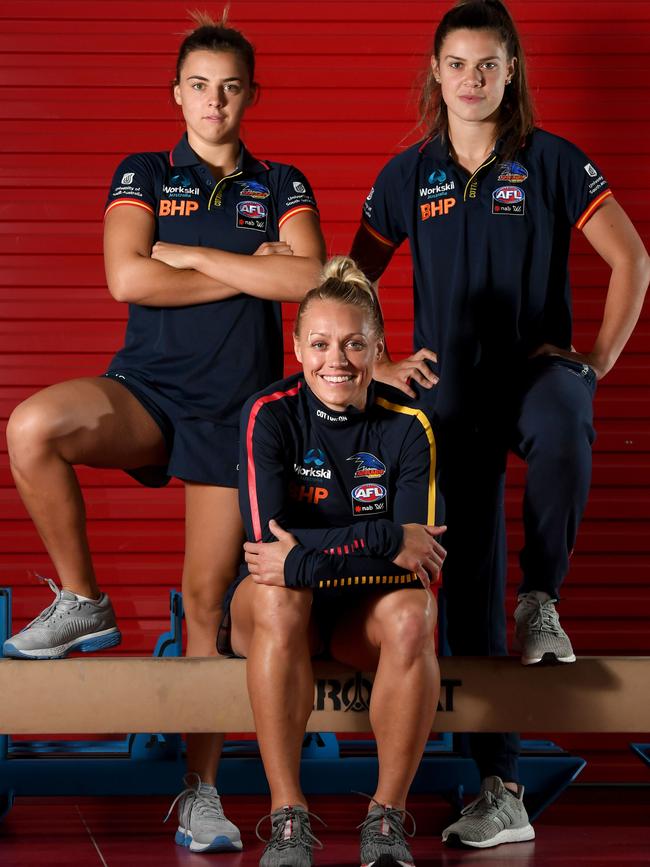 Crows co-captain Erin Phillips, centre, pictured with her AFLW team-mates Ebony Marinoff and Anne Hatchard. Picture: Tricia Watkinson