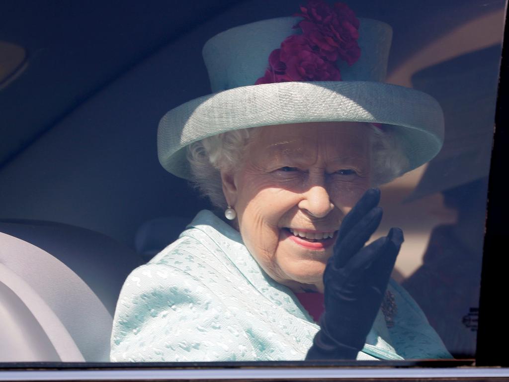 Britain's Queen Elizabeth II waves from her car in a file photo from 2019. Picture: AFP