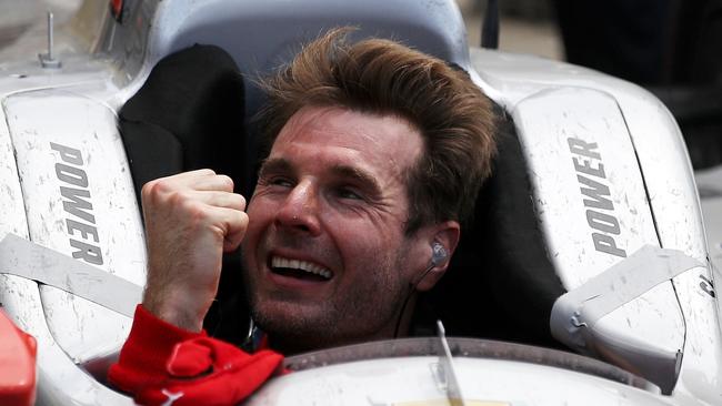 INDIANAPOLIS, IN - MAY 27: Will Power of Australia, driver of the #12 Verizon Team Penske Chevrolet celebrates after winning the 102nd Running of the Indianapolis 500 at Indianapolis Motorspeedway on May 27, 2018 in Indianapolis, Indiana.   Chris Graythen/Getty Images/AFP == FOR NEWSPAPERS, INTERNET, TELCOS & TELEVISION USE ONLY ==