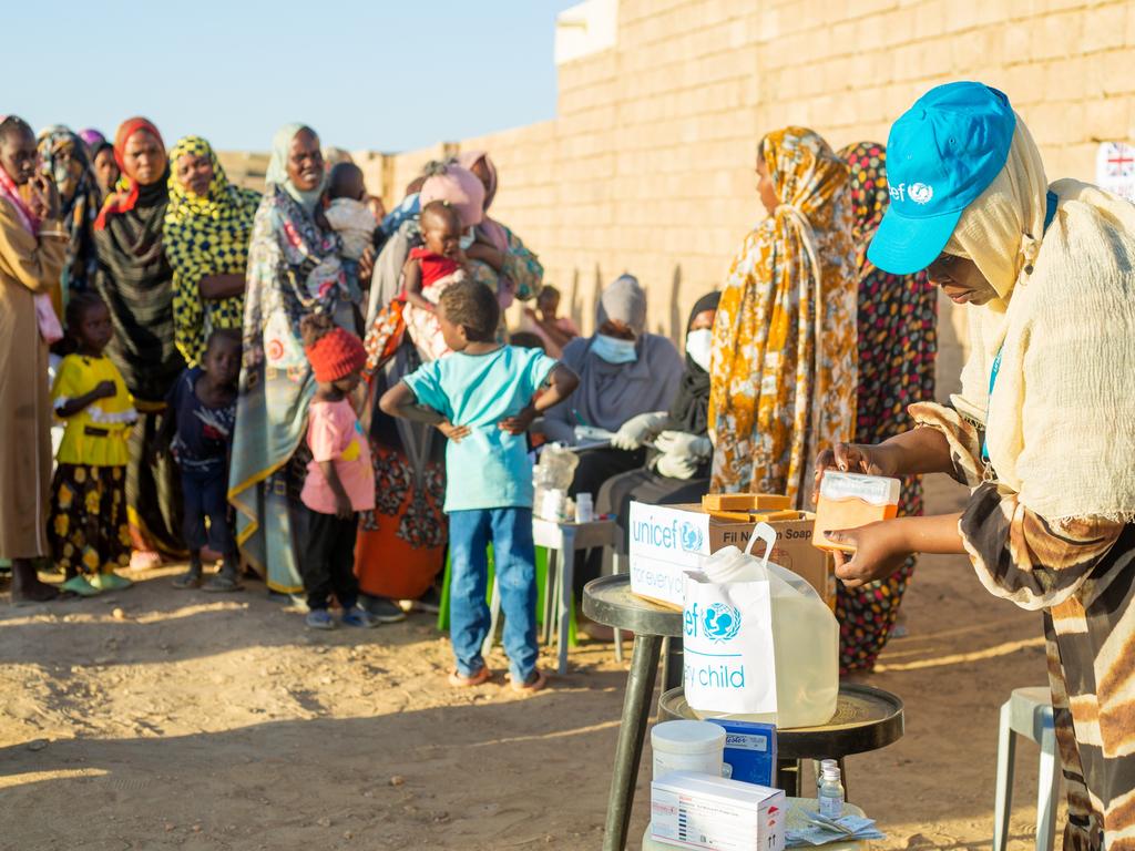 Displaced children are screened for malnutrition during the UNICEF integrated health, nutrition, and Water, Sanitation and Health (WASH) campaign at Alnahda gathering point, River Nile state. Picture: UNICEF