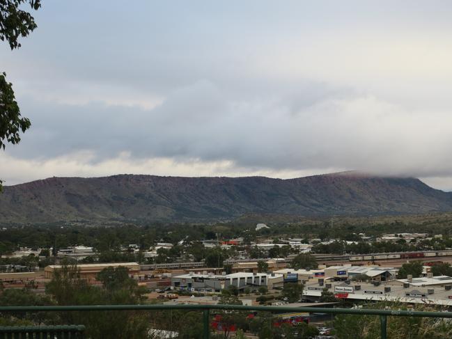 A cloud hangs over the West MacDonnell Ranges, Alice Springs. Picture: Gera Kazakov Generic