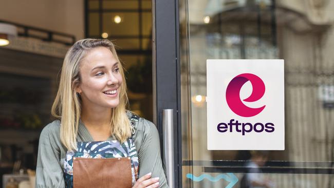 The eftpos logo at a cafe shopfront.