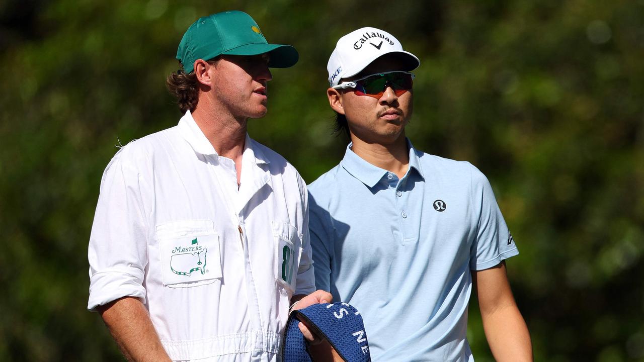 Min Woo Lee and his caddie Stuart Davidson at the Masters. Picture: Andrew Redington / Getty Images North America / Getty Images via AFP