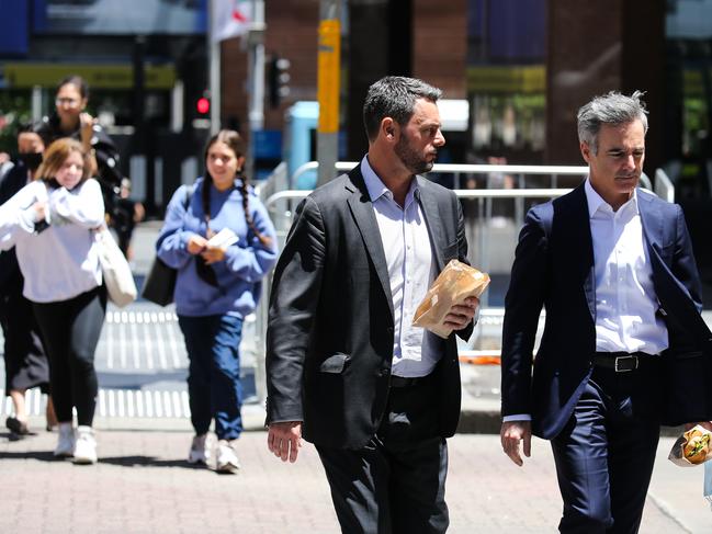 SYDNEY, AUSTRALIA - NewsWire Photos, NOVEMBER 16 2021:  Sydney siders are seen wearing suits in the CBD, during lunch time in Sydney. Picture: NCA Newswire / Gaye Gerard